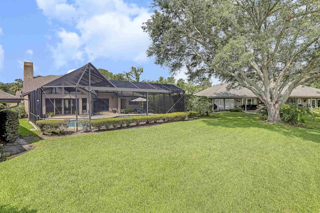 1 Sandpiper Cv, Ponte Vedra Beach, FL 32082 - view of grassy yard featuring an outdoor pool, a lanai, and a patio