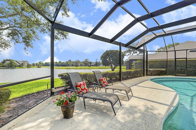 1 Sandpiper Cv, Ponte Vedra Beach, FL 32082 - outdoor pool featuring a patio, a water view, and glass enclosure