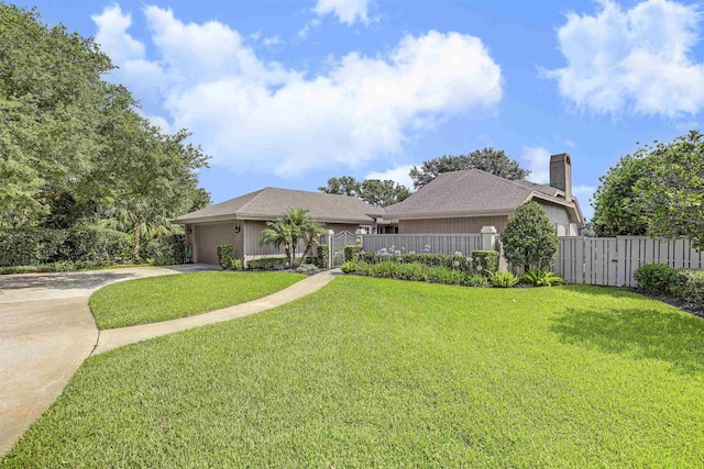 1 Sandpiper Cv, Ponte Vedra Beach, FL 32082 - view of front of property featuring concrete driveway, a garage, and a chimney