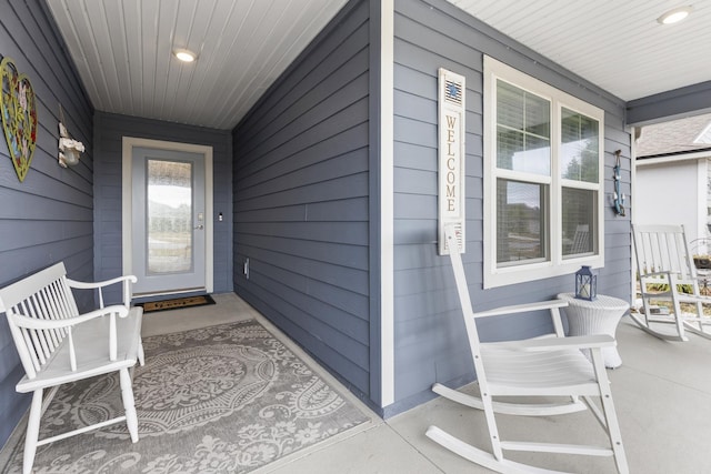 doorway to property with a porch