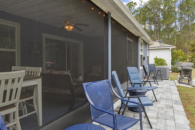 view of patio / terrace with cooling unit, ceiling fan, and a grill