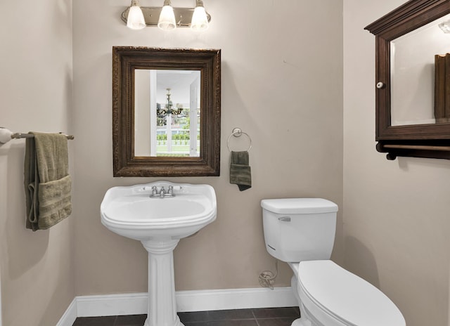 12 E Park Ave, Saint Augustine, FL 32084 - bathroom featuring tile patterned flooring and a chandelier