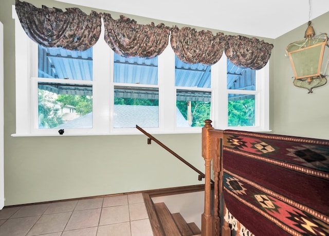 12 E Park Ave, Saint Augustine, FL 32084 - stairs with plenty of natural light and tile patterned floors