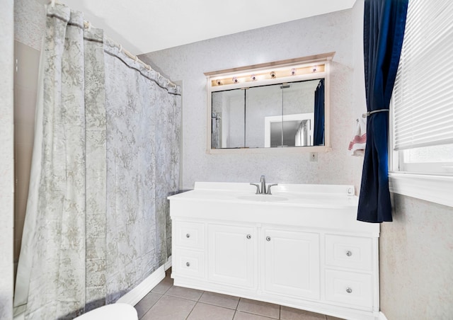 bathroom featuring tile patterned floors and vanity