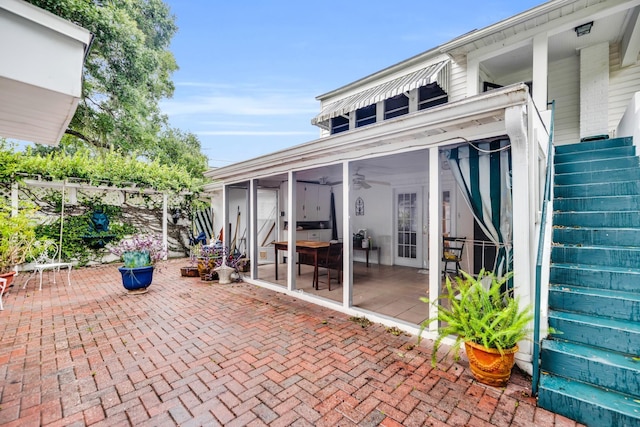 12 E Park Ave, Saint Augustine, FL 32084 - view of patio with a sunroom, stairway, and ceiling fan