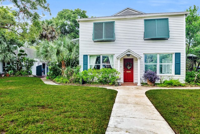 12 E Park Ave, Saint Augustine, FL 32084 - traditional-style home featuring a front lawn