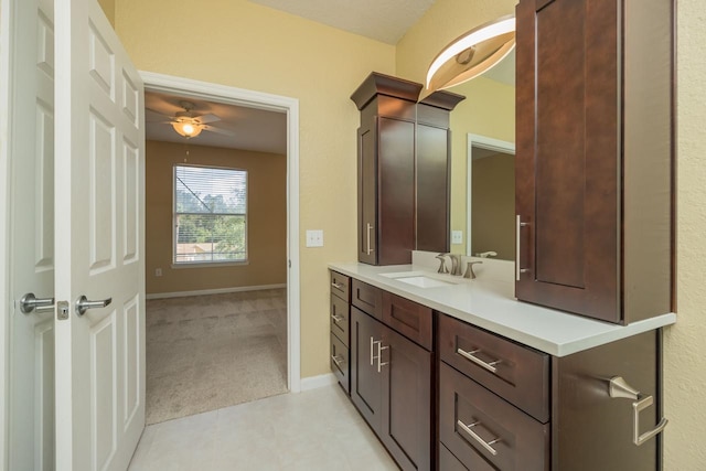 bathroom featuring vanity and ceiling fan