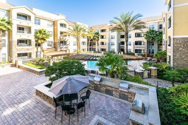 view of pool featuring a patio area