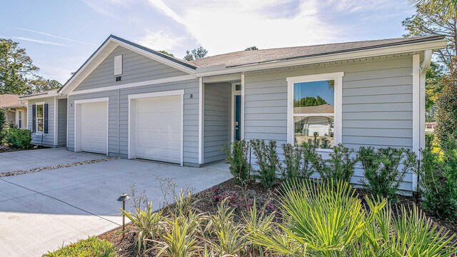 55 Rose Dr Unit B, Palm Coast, FL 32164 - single story home with a garage