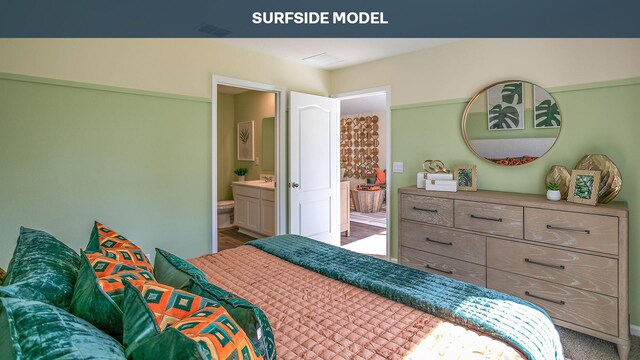 55 Rose Dr Unit B, Palm Coast, FL 32164 - bedroom featuring ensuite bath and carpet floors