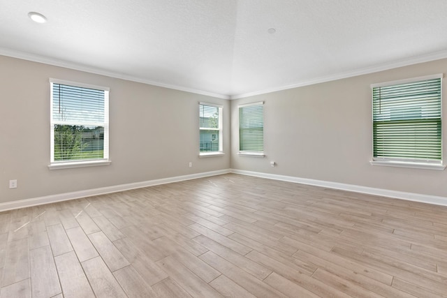 42 Huesca Ct, Saint Augustine, FL 32084 - unfurnished room featuring a wealth of natural light, light wood finished floors, and baseboards