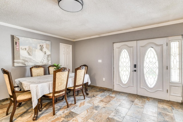 dining space featuring crown molding and a textured ceiling