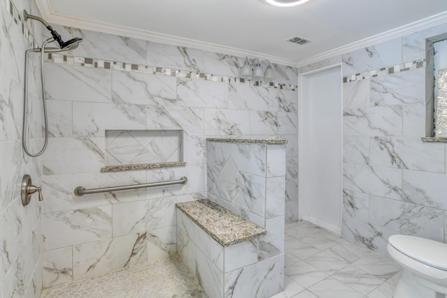 bathroom with a tile shower, toilet, and crown molding