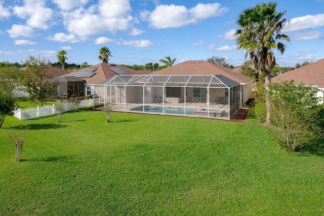 exterior space with a yard and a lanai