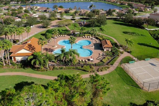 birds eye view of property featuring a water view