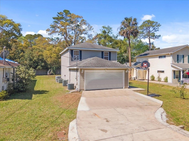 traditional-style house featuring a garage, central AC unit, concrete driveway, and a front lawn