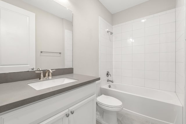 bathroom with vanity, toilet, and bathing tub / shower combination