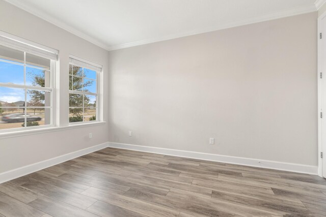 kitchen with pendant lighting, a kitchen island with sink, white cabinets, and appliances with stainless steel finishes