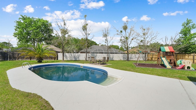 view of pool featuring a fenced backyard, a playground, a fenced in pool, and a lawn