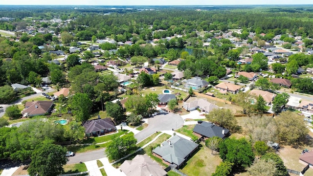 aerial view with a forest view and a residential view