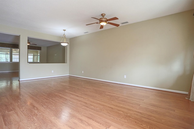 312 Brantley Harbor Dr, Saint Augustine, FL 32086 - unfurnished room with a ceiling fan, baseboards, visible vents, and light wood finished floors