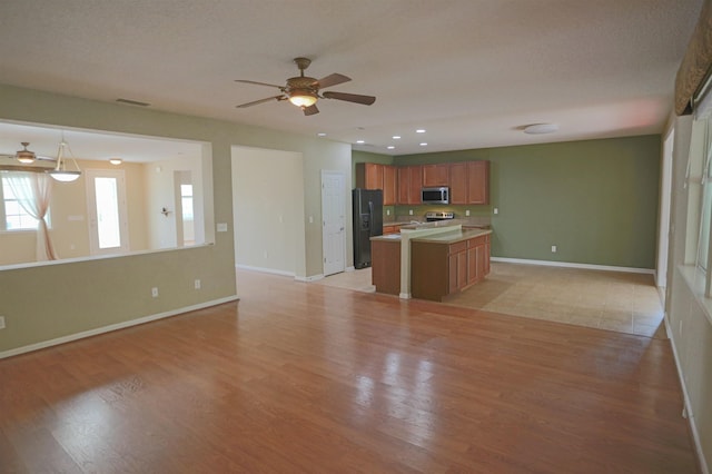 312 Brantley Harbor Dr, Saint Augustine, FL 32086 - interior space with light wood-type flooring, recessed lighting, baseboards, and ceiling fan