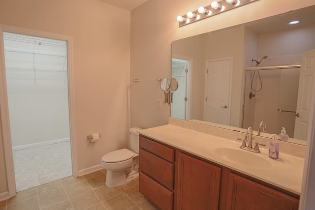 312 Brantley Harbor Dr, Saint Augustine, FL 32086 - full bath with vanity, toilet, tile patterned floors, a spacious closet, and a shower stall