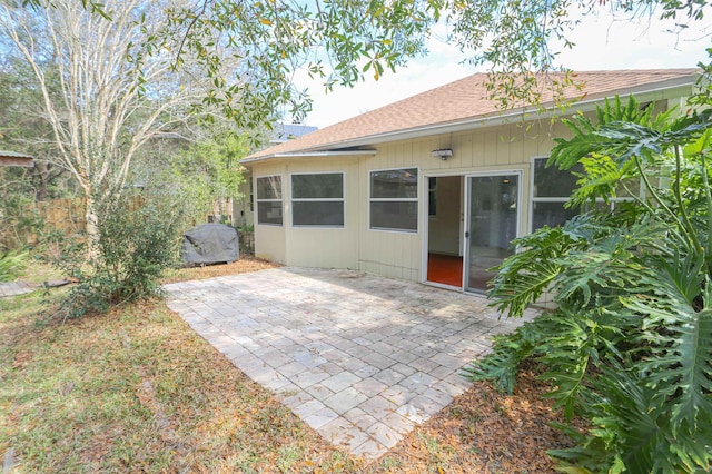 312 Brantley Harbor Dr, Saint Augustine, FL 32086 - exterior space with a shingled roof and a patio area