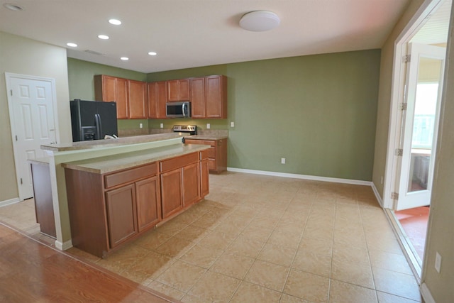312 Brantley Harbor Dr, Saint Augustine, FL 32086 - kitchen featuring light countertops, recessed lighting, baseboards, and appliances with stainless steel finishes