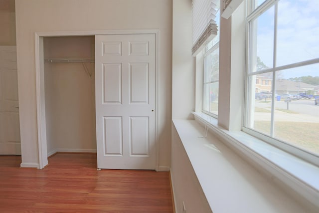 312 Brantley Harbor Dr, Saint Augustine, FL 32086 - unfurnished bedroom with light wood-style floors, baseboards, and a closet