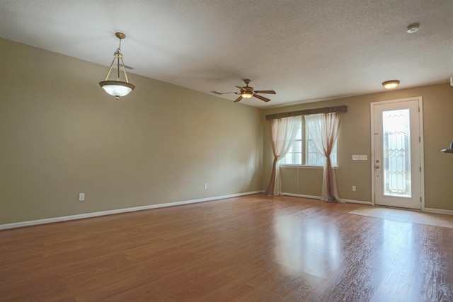 312 Brantley Harbor Dr, Saint Augustine, FL 32086 - interior space featuring light wood-type flooring, a textured ceiling, baseboards, and ceiling fan