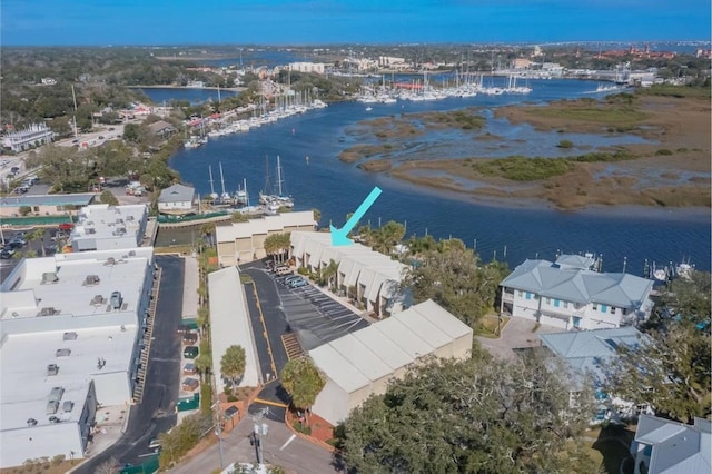 birds eye view of property featuring a water view