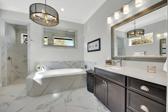 full bath with a garden tub, a notable chandelier, marble finish floor, a marble finish shower, and crown molding