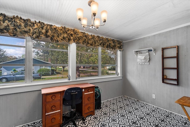 unfurnished office with ornamental molding, a notable chandelier, and wood walls