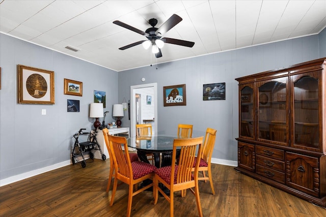 dining room featuring dark hardwood / wood-style floors and ceiling fan