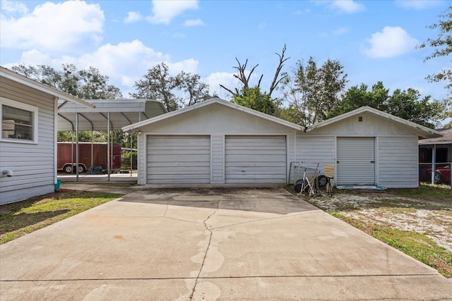 garage featuring a carport