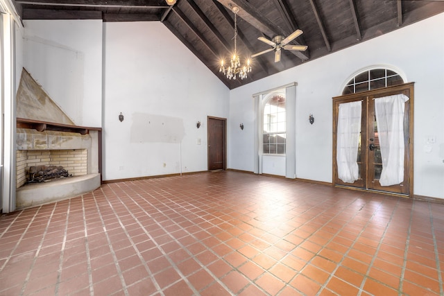 unfurnished living room featuring high vaulted ceiling, french doors, tile patterned flooring, ceiling fan, and beamed ceiling