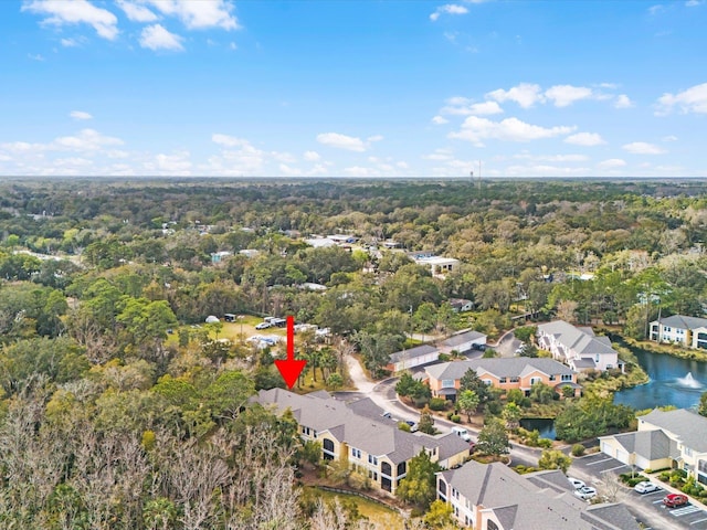 bird's eye view with a residential view and a water view