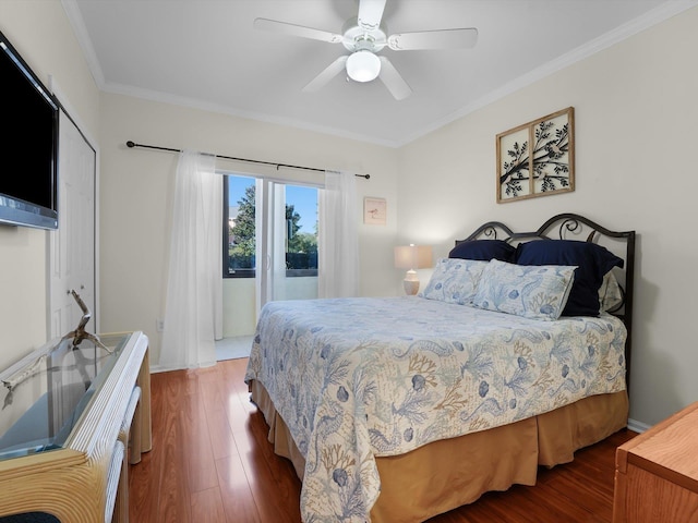 bedroom featuring dark wood-type flooring, ceiling fan, ornamental molding, and access to outside