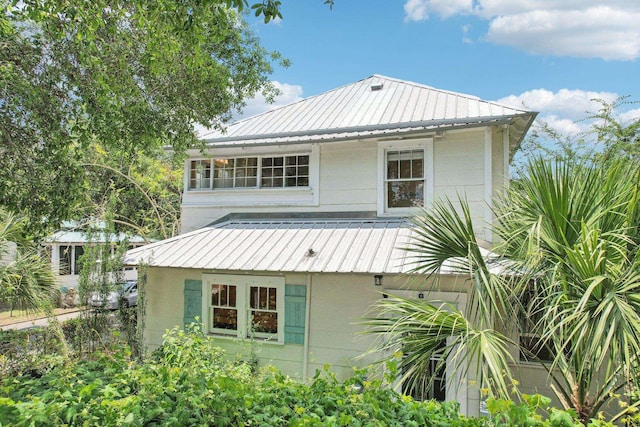 127 M L King Ave, Saint Augustine, FL 32084 - view of property exterior with metal roof