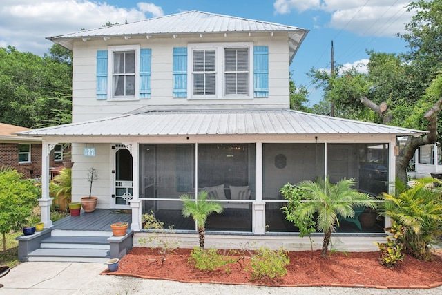 127 M L King Ave, Saint Augustine, FL 32084 - view of front of property with metal roof and a sunroom
