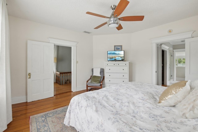 127 M L King Ave, Saint Augustine, FL 32084 - bedroom featuring wood finished floors, baseboards, and ceiling fan