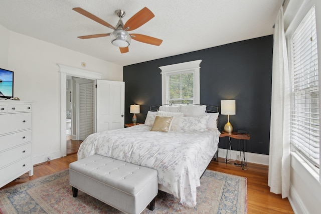 127 M L King Ave, Saint Augustine, FL 32084 - bedroom featuring wood finished floors, baseboards, a textured ceiling, and ceiling fan