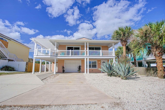 raised beach house with a garage