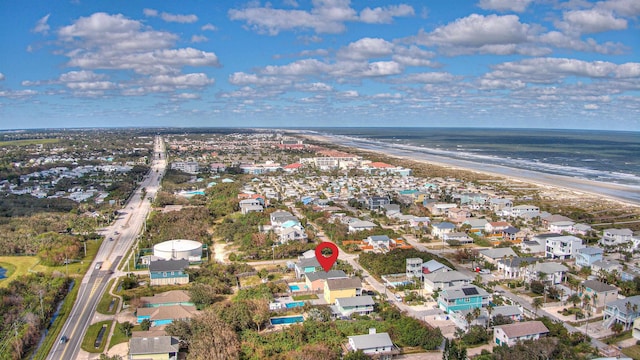 aerial view featuring a beach view and a water view