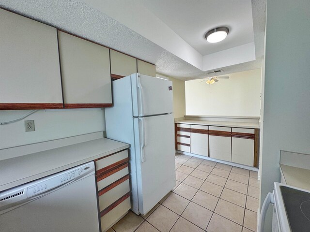 221 Mayan Ter, Saint Augustine, FL 32080 - kitchen featuring white appliances, light tile patterned floors, ceiling fan, and light countertops