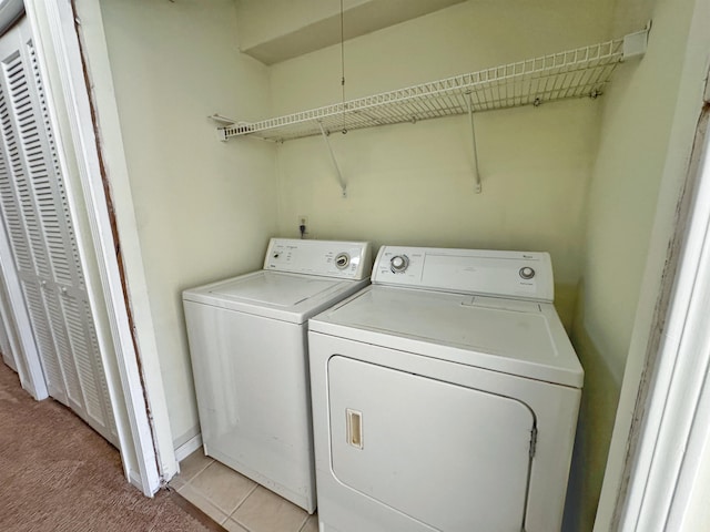 221 Mayan Ter, Saint Augustine, FL 32080 - washroom featuring washer and clothes dryer and light colored carpet