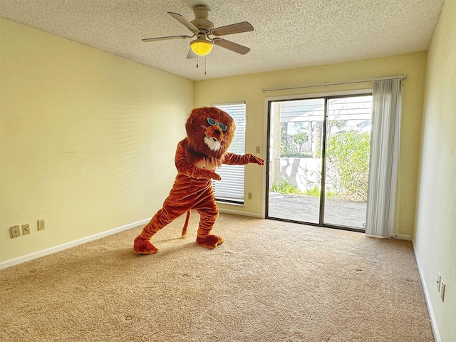 221 Mayan Ter, Saint Augustine, FL 32080 - playroom featuring carpet flooring, a ceiling fan, and a textured ceiling