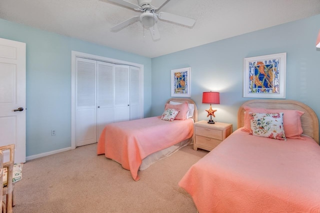6170 A1A S Unit 101, Saint Augustine, FL 32080 - bedroom featuring a closet, light colored carpet, baseboards, and ceiling fan