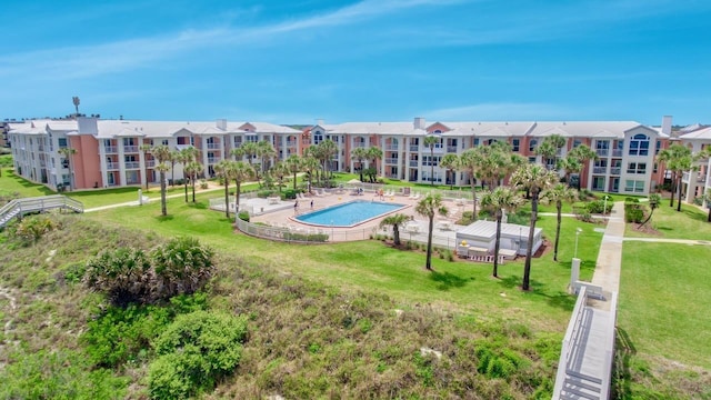 6170 A1A S Unit 101, Saint Augustine, FL 32080 - surrounding community with a lawn and a putting area